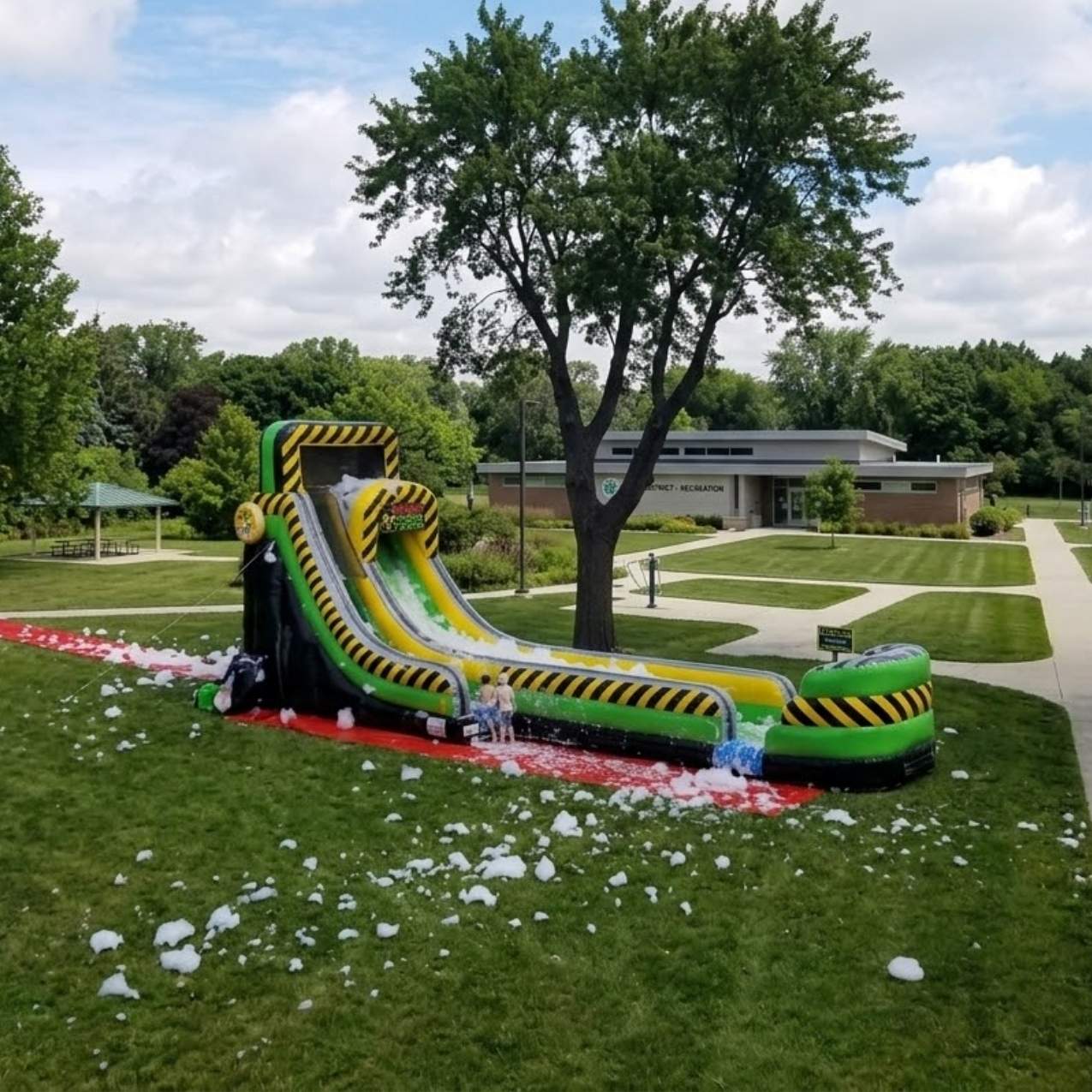 Water slide rentals category card for Schaumburg IL — Jurassic Rush dual lane water slide at 9.70 CPC